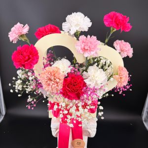 Heart-shaped basket with carnations